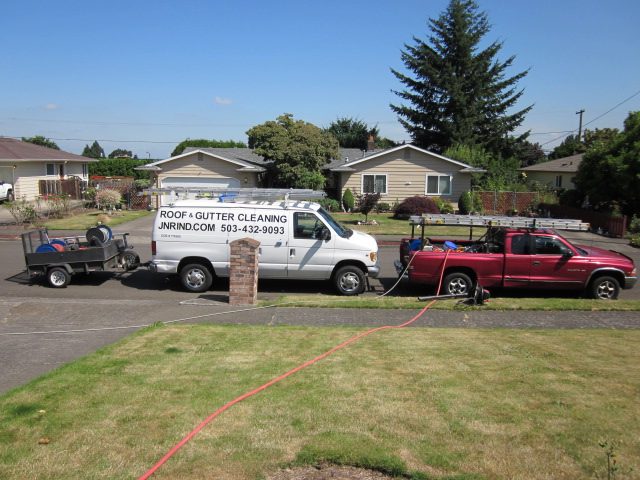The JNR Industries work truck and rig used for roof cleaning and moss treatment jobs